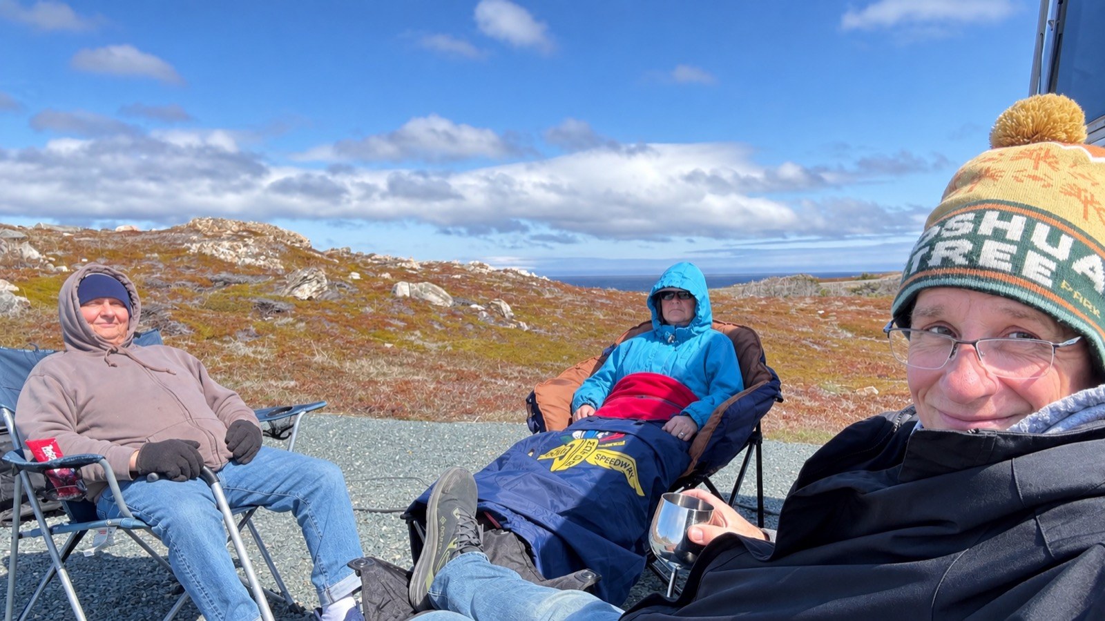Our group bundled up in camp chairs enjoying a sunny afternoon at Landfall Municipal Park, before the storm arrived