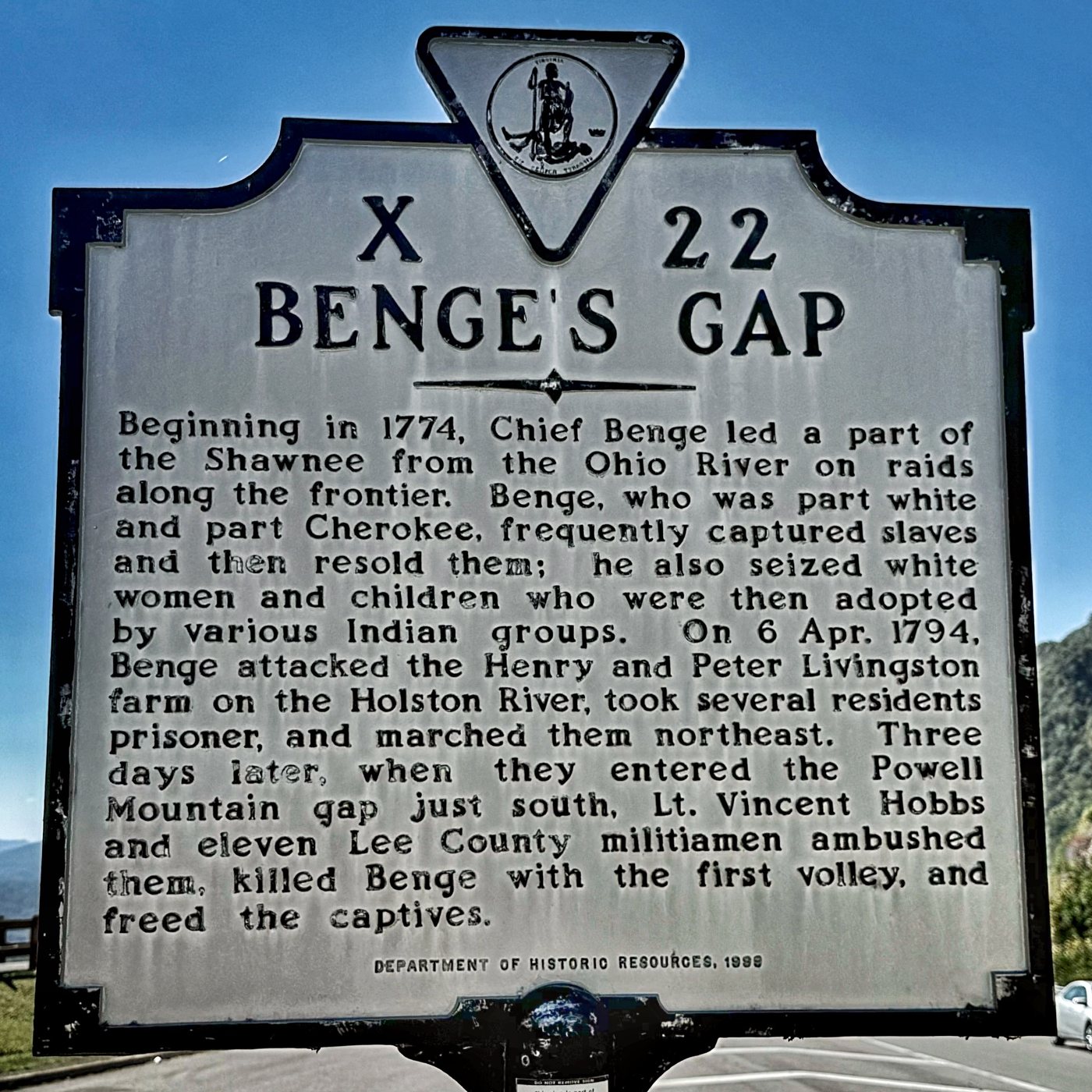 A Virginia historical marker titled Benge's Gap, number X-22, standing at the overlook against a blue sky