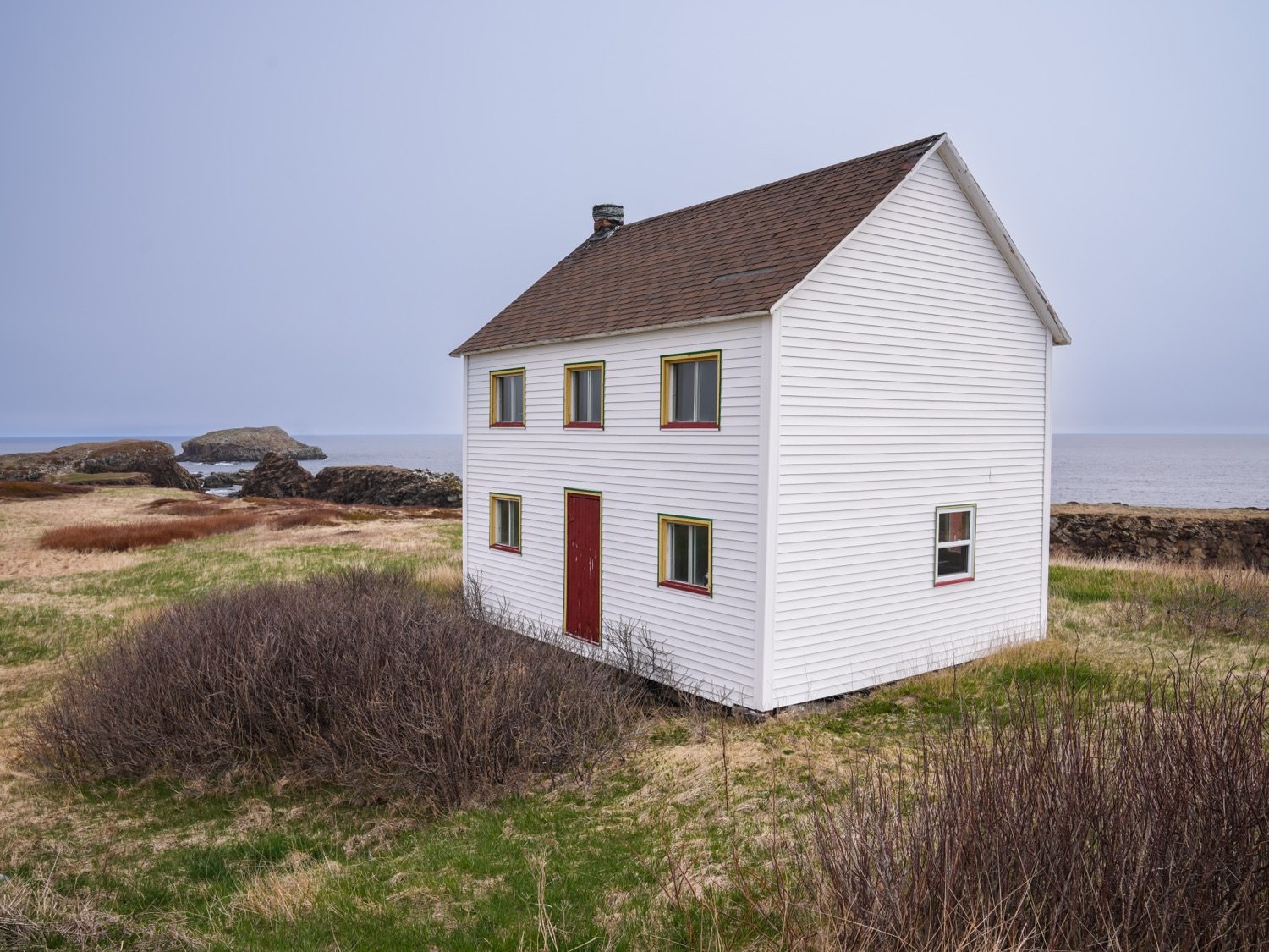 A white saltbox house on the coast at Elliston